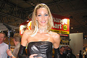 Lisa Butcher models leather "Audi" dress designed by Scott Henshall