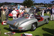 Mercedes 300 SL Coupe with golf bag