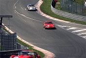 The pack stampeding uphill Eau Rouge