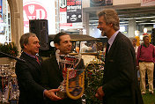 Götz Seidel & Helmut Eberlein being handed over the prize for the official Ferrari Display