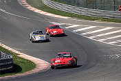 The pack stampeding uphill Eau Rouge