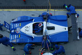 Pit stop for SR2 winners, Pier Giuseppe Peroni and Mirco Savoldi in the Lucchini SR2- 2002