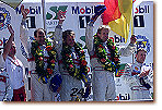 Head of Audi Sport Dr Wolfgang Ullrich, Emanuele Pirro, Tom Kristensen, Frank Biela on the Podium