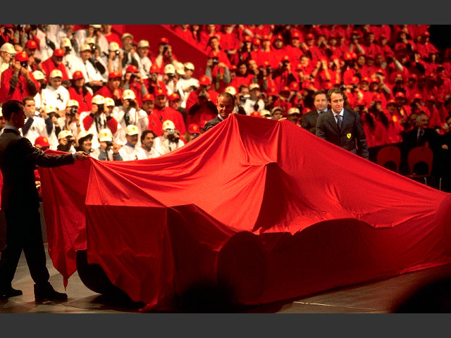 Michael Schumacher, Rubens Barrichello and Luca Badoer lifting the veil