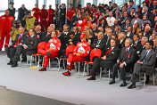 Rubens Barrichello, Michael Schumacher and Luca di Montezemolo in the front row