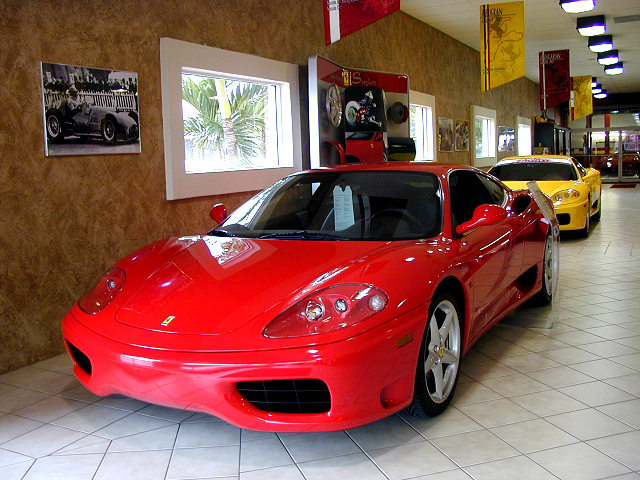 360 Modena F1 s/n 117381, in red with black interior, another with the F1 gear change s/n 116266, in yellow with black interior