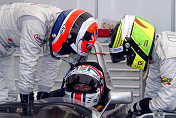 Jamie Davies buckles into the Audi UK Prototype with help from  co-drivers Johnny Herbert (left) and Guy Smith