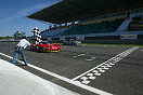 Fabio Babini, Ferrari 575 GTC s/n 2208 crosses finishing line to win