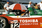 Alex Caffi keeping out of the sun while waiting to qualify the Doyle-Risi Ferrari 333 SP s/n 018.  He qualified 6th, the fastest of the 5 Ferraris entered.  The car also finished 6th in the race, the only Ferrari to last thefull 12 hours.