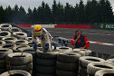 Mike Hezemans crawls away from his accident at Eau Rouge