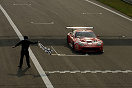 Fabrizio Gollin taks the flag in the #22 BMS Scuderia Italia 550 Maranello