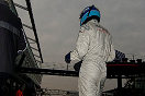 Mark Lieb awaits the arrival of the #50 Freisinger Porsche during  morning warm-up