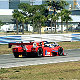 The 333 SP s/n 025 of Didier Theys, Mauro Baldi and Fredy Lienhard overtakes the Porsche GT1 of Boutsen/Wollek/Muller