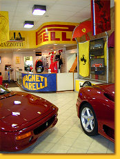 110765, in Rosso Barchetta with tan interior, together with a 360 Modena F1, 117381, in red with black interior