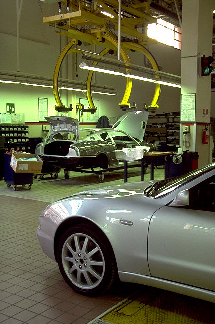 3200GT on production line over a finished example, showing cradle on monorail