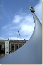 Enormous conical structure reaching skyward, atop which was perched a 300 SL Gullwing coupe